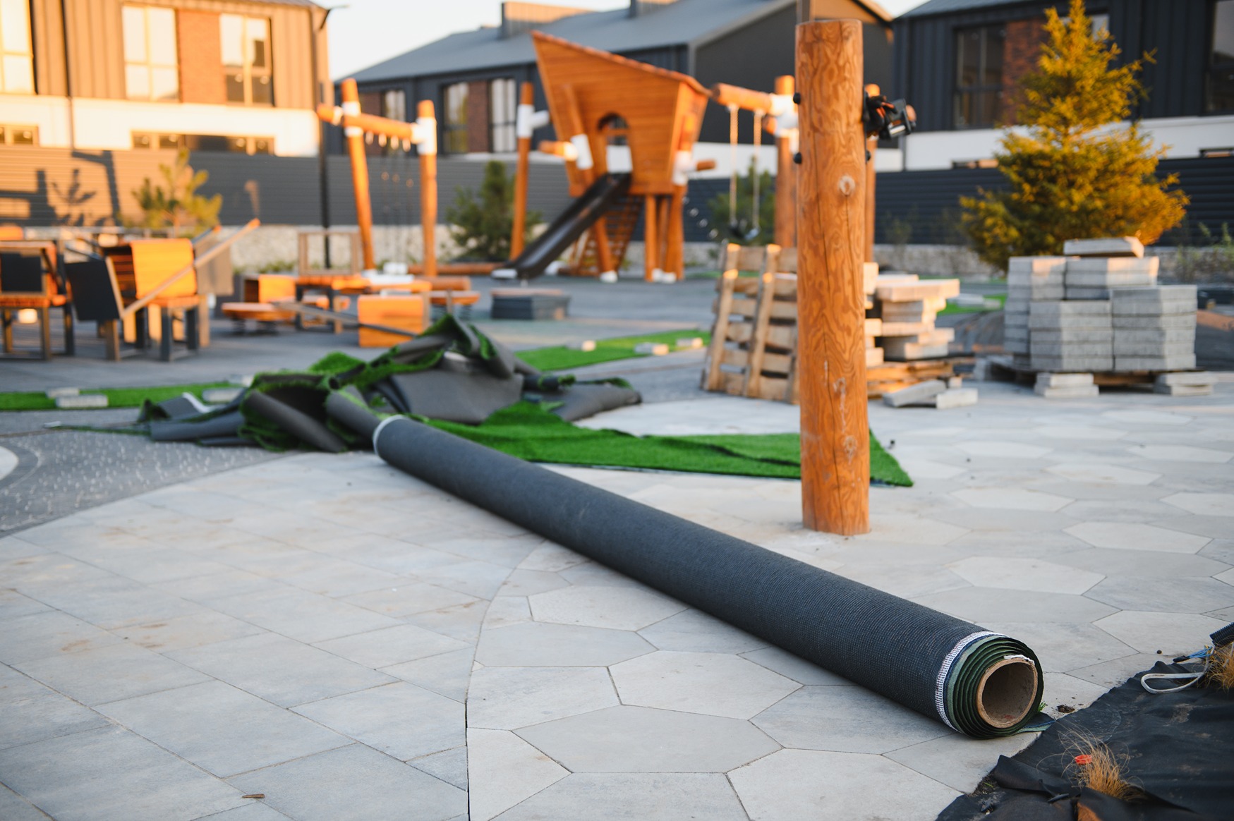 concrete patio installed next to a paver patio in a Seattle backyard