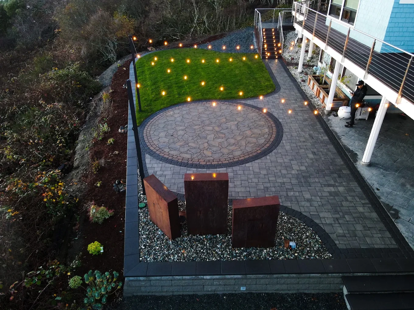 Bothell homeowner reviewing landscape design results with Angkorscape design team