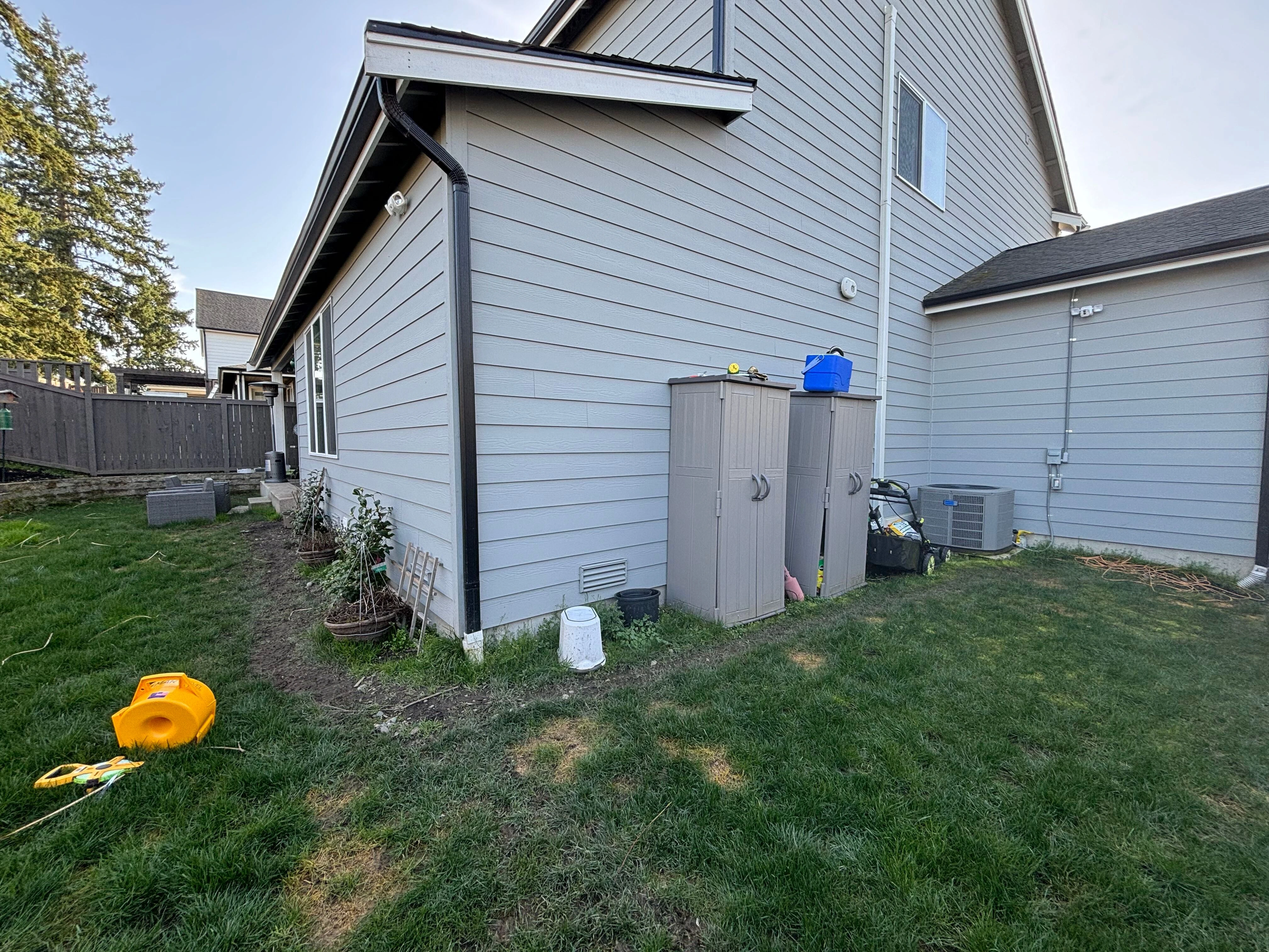 Before neglected backyard in Sammamish Washington awaiting landscape renovation