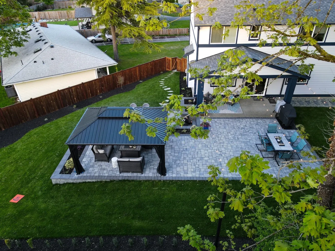 Landscape designer consulting Sammamish homeowner about project details and plans
