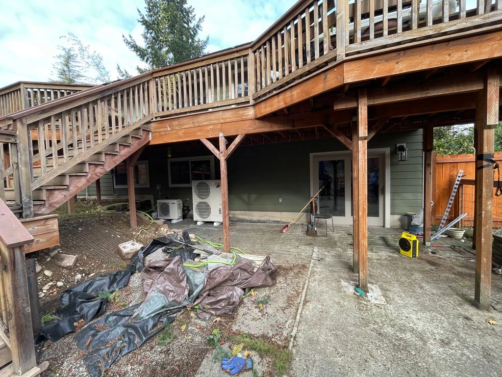 Before neglected backyard in Redmond Washington awaiting landscape renovation