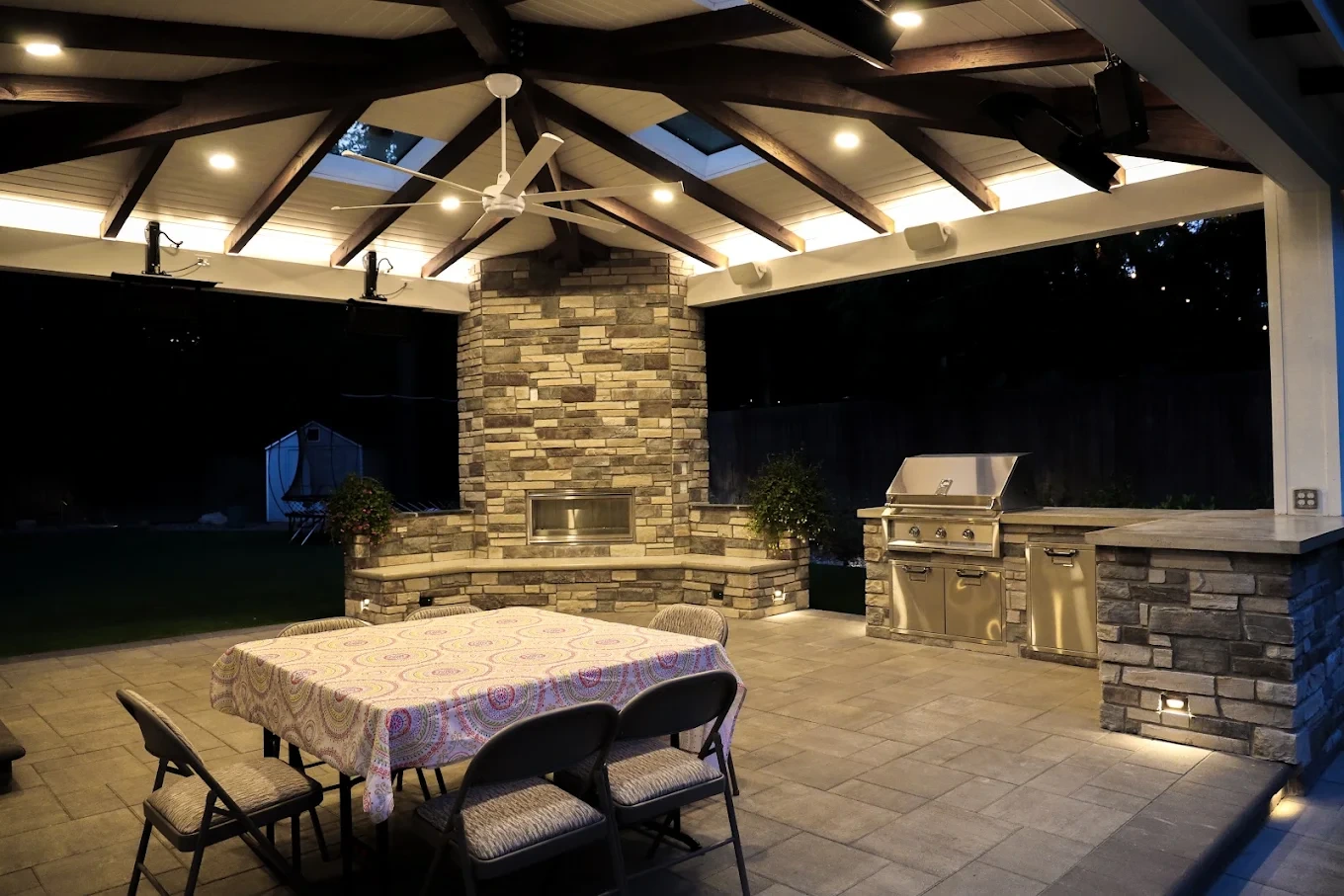 Outdoor kitchen construction with durable composite and stainless steel materials built to withstand Bothell Pacific Northwest weather conditions