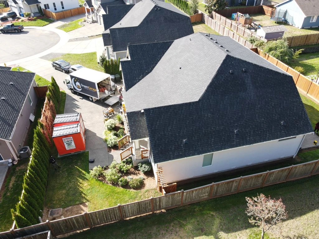 Issaquah before aerial view house concrete patio moving truck lawn