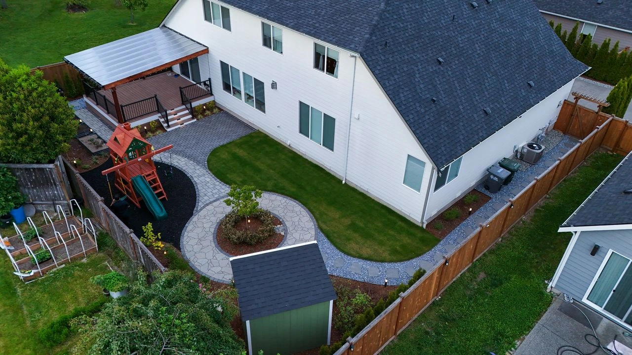 Issaquah after aerial covered pergola deck play structure landscaping