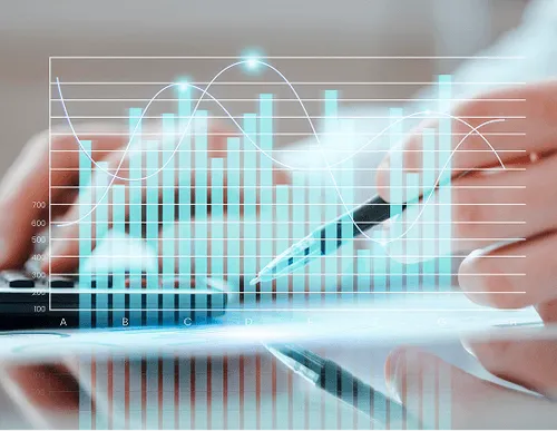 "Close-up of a hand holding a pen interacting with a holographic financial dashboard.