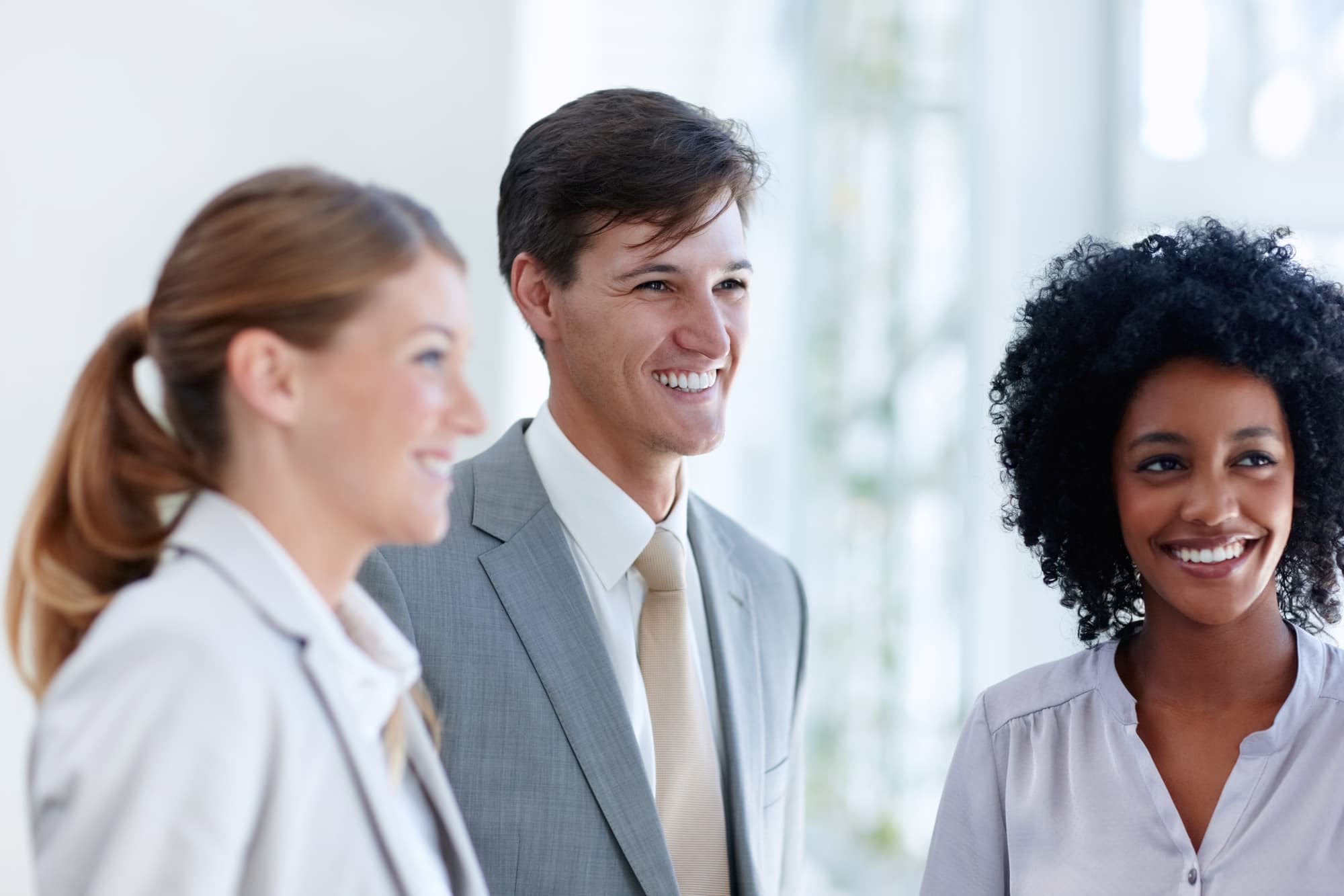 Happy, office and smile for collaboration, group and joy for teamwork, professional and confident. Business, friends and employees of insurance company, underwriter and diversity of corporate people