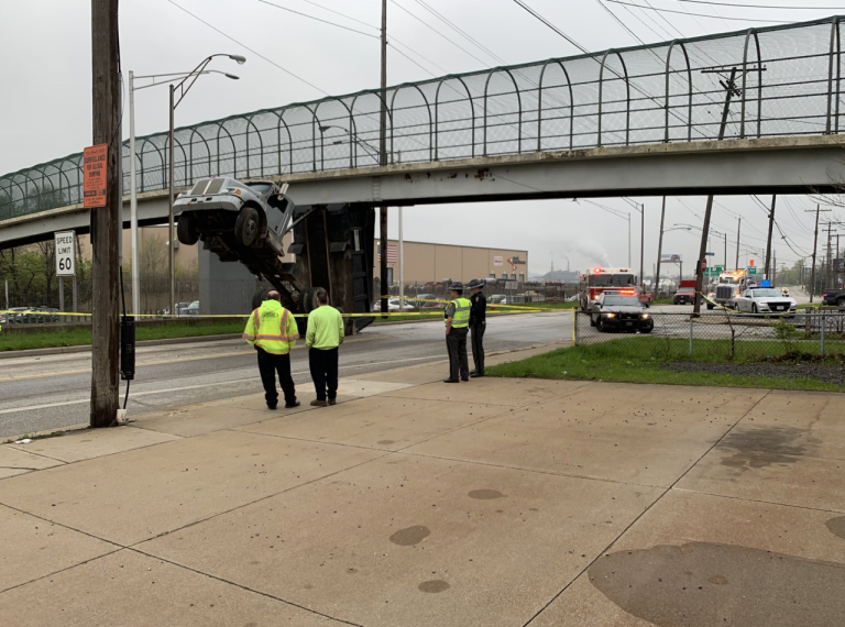 dump-truck-hits-bridge-cleveland-ohio