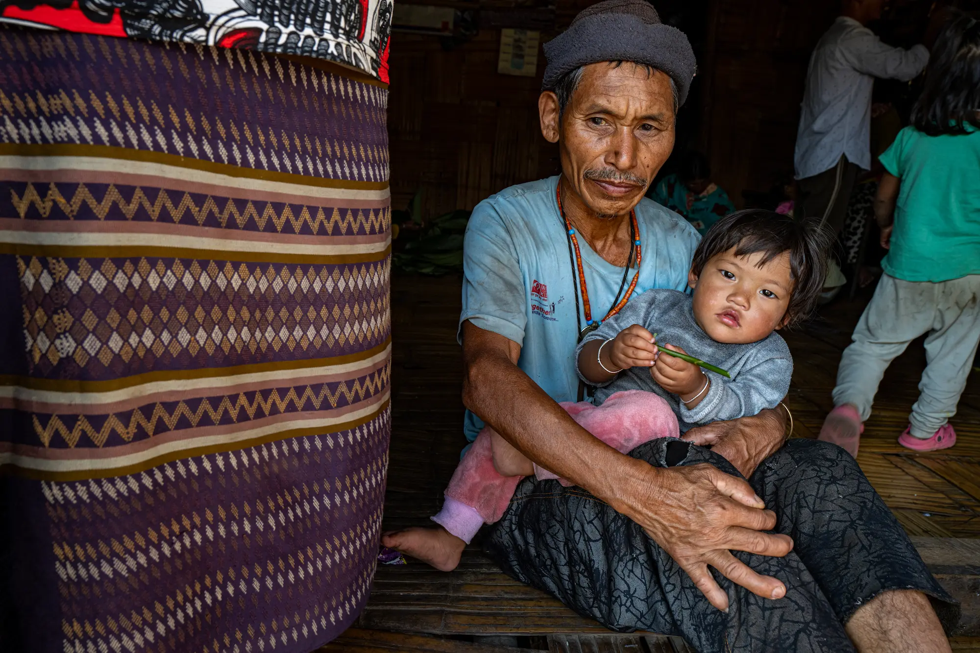 Ancien guerrier de l'Arunachal Pradesh en tenue ancestrale © Patrick Frilet