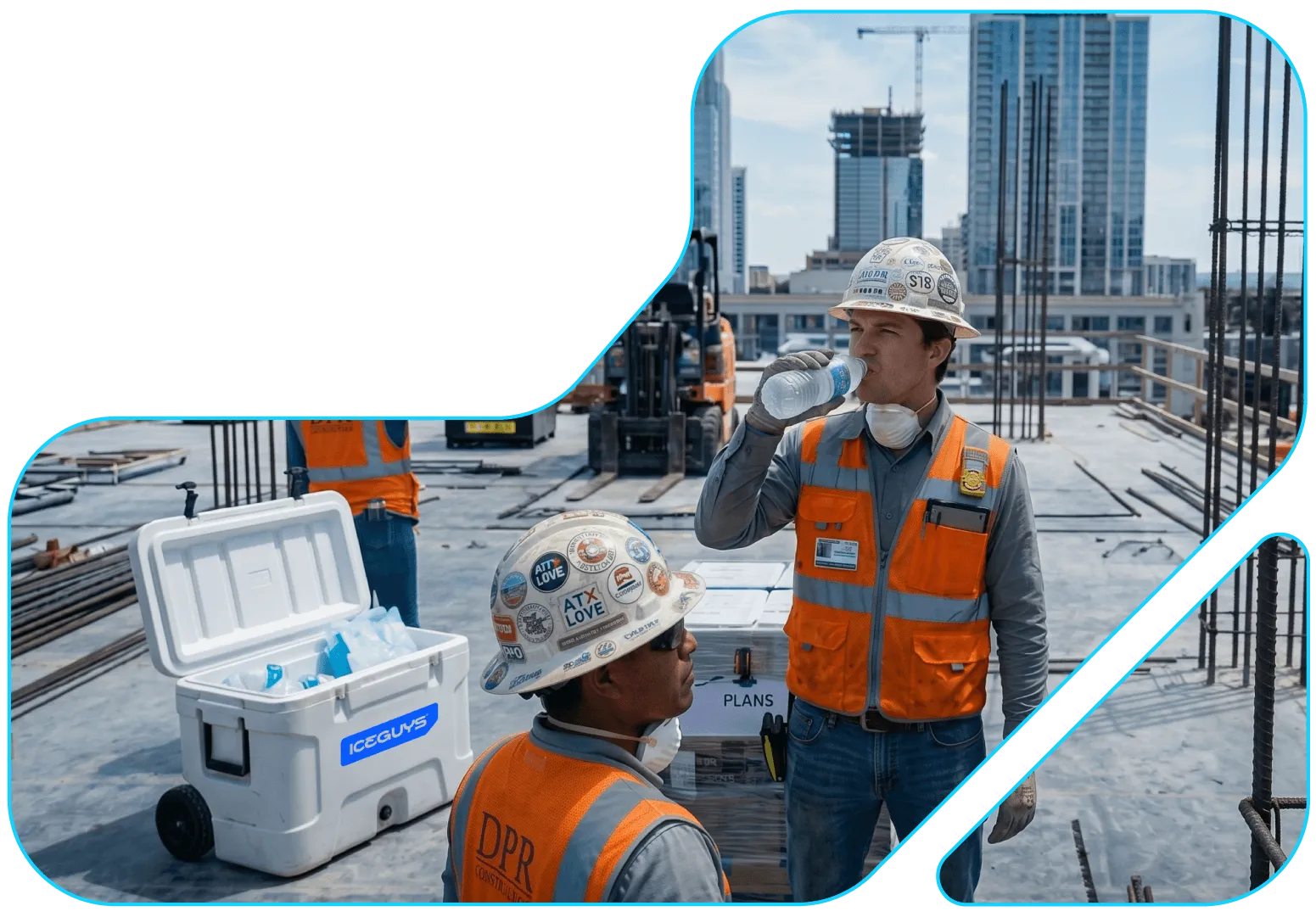 Two construction workers wearing hard hats and orange safety vests on a rooftop site with a cooler.