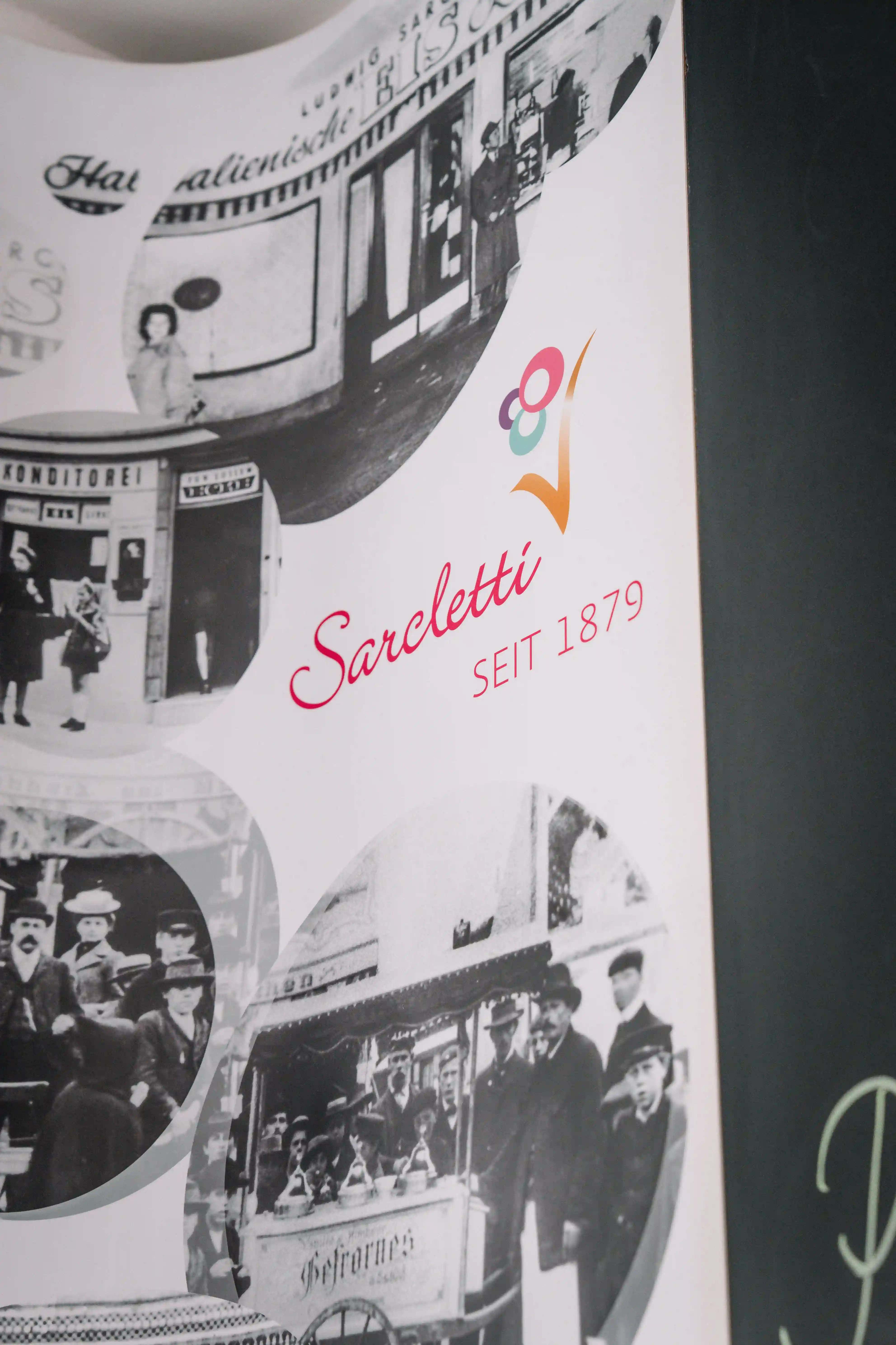Collage of historic black and white photos with Sarcletti logo and text 'SEIT 1879'.