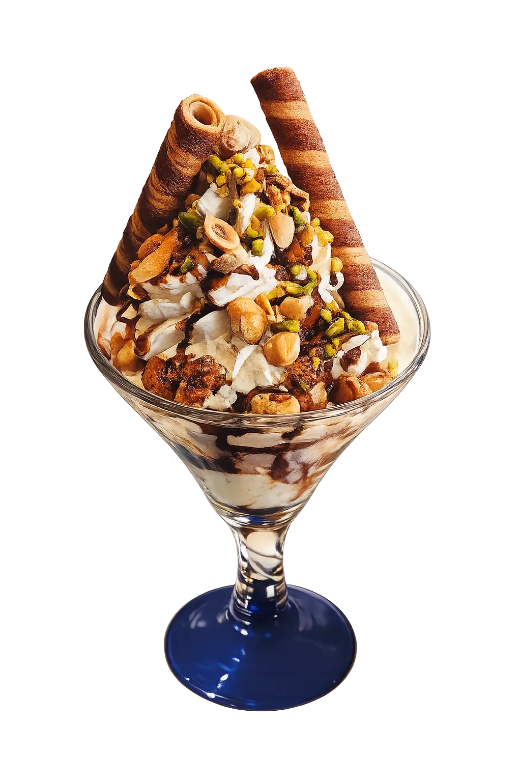 Glass dessert with whipped cream, chocolate drizzle, nuts, and two chocolate wafer sticks on top.
