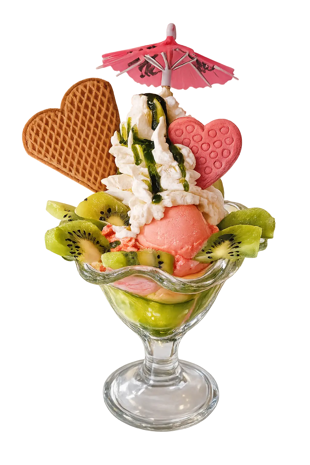 Ice cream sundae with kiwi slices, whipped cream, waffle heart, pink cookie heart, and a pink umbrella.