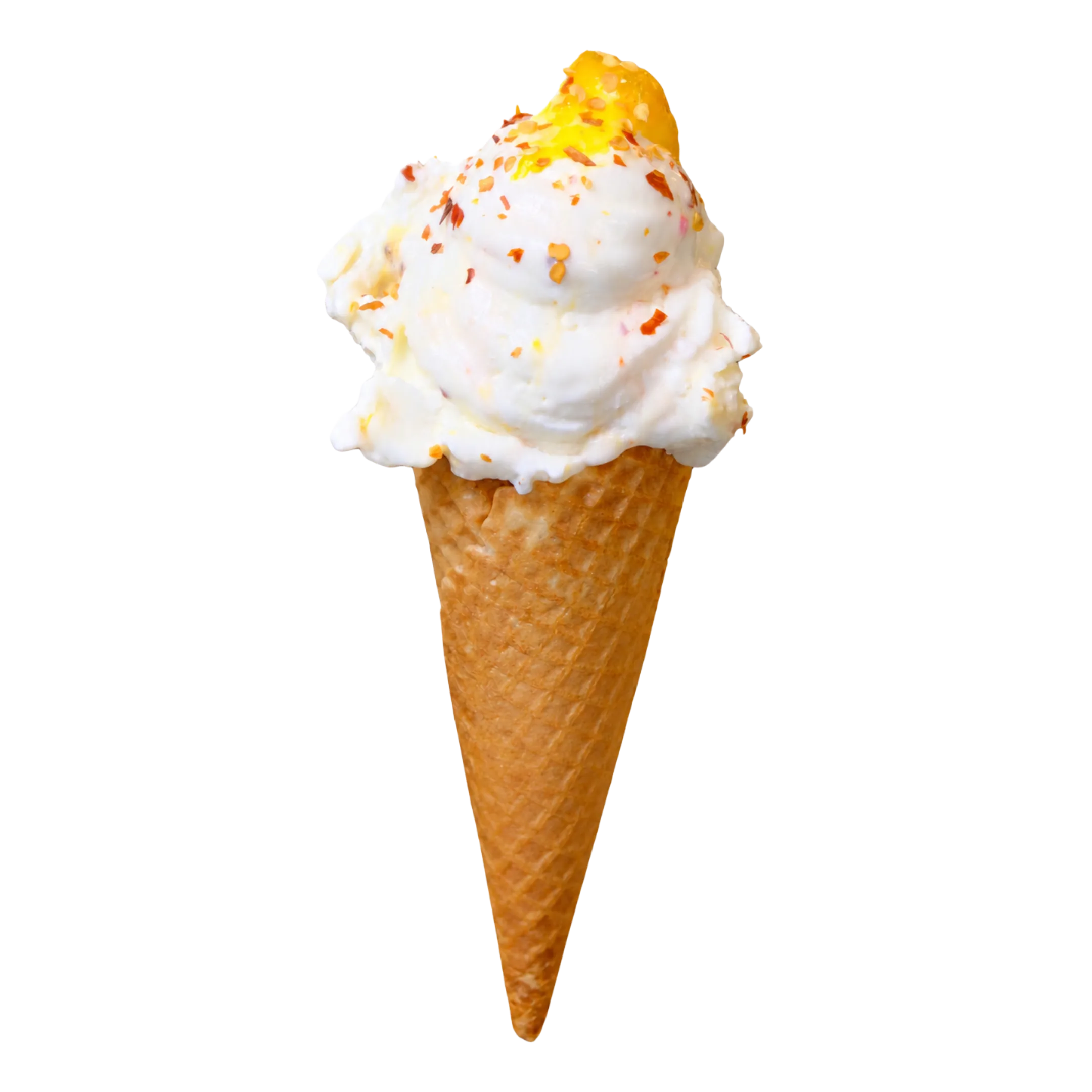Vanilla ice cream cone topped with chili flakes and a small piece of yellow fruit.
