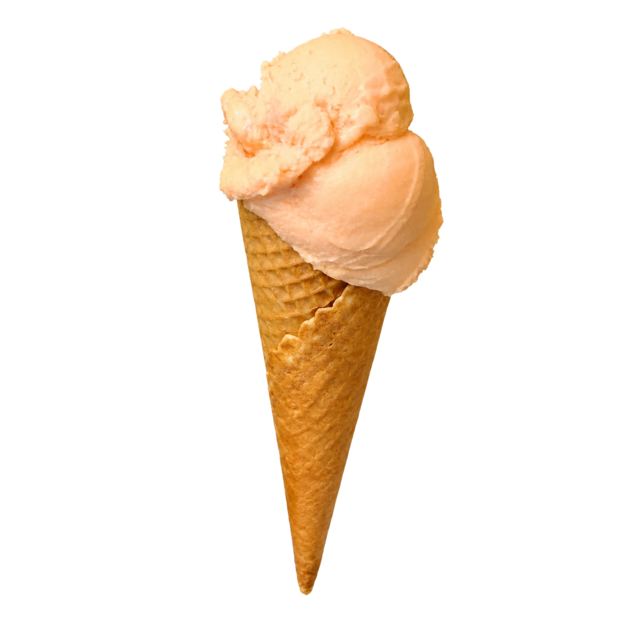 Single scoop of light orange sorbet in a waffle cone against a black background.