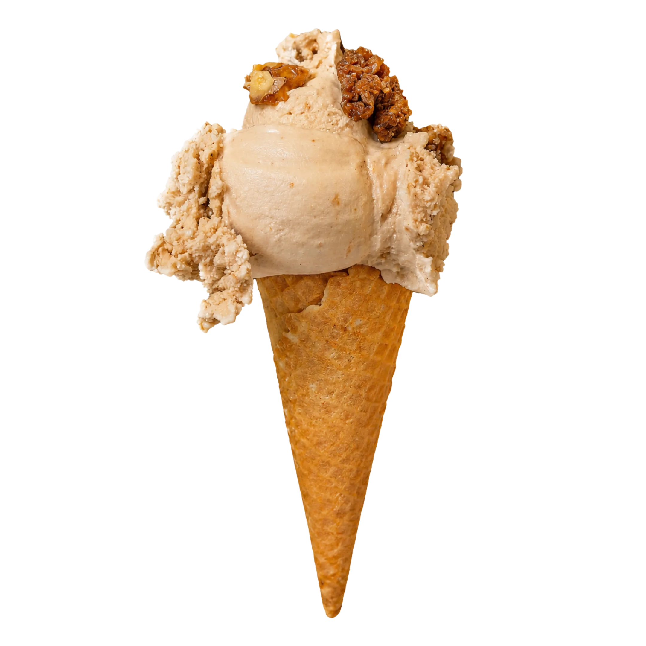 Cone with a scoop of beige ice cream topped with walnut pieces on a black background.