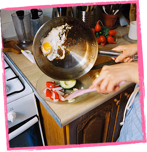 Person cooking eggs