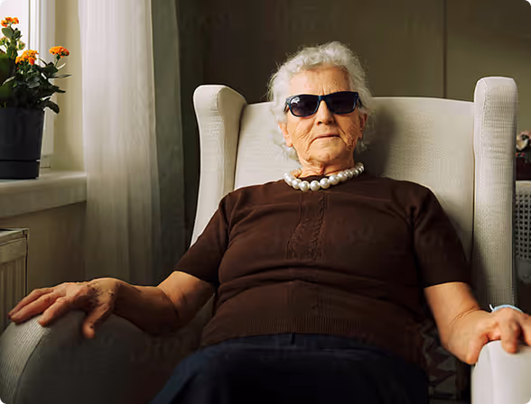 Elderly woman wearing sunglasses