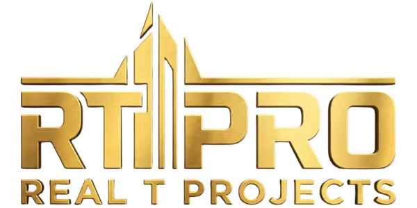 RT Pro Real T Projects company logo in gold lettering with stylized building graphic.
