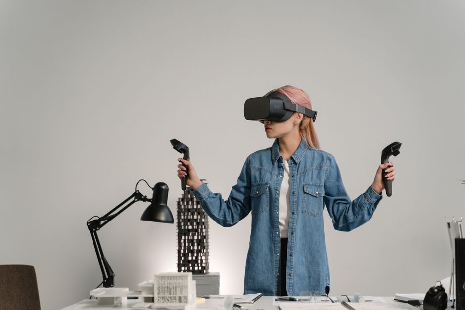 architect demonstrating VR walkthrough to client - Digital Marketing for Architecture & Design Studios