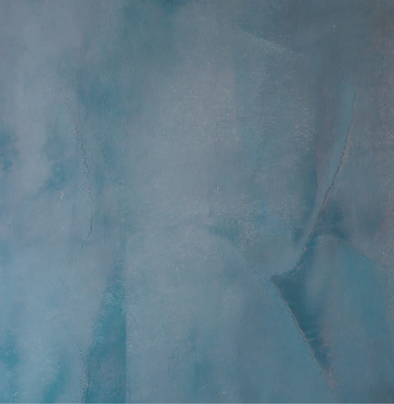 Texture d'une chaux ferrée bleu canard en gros plan