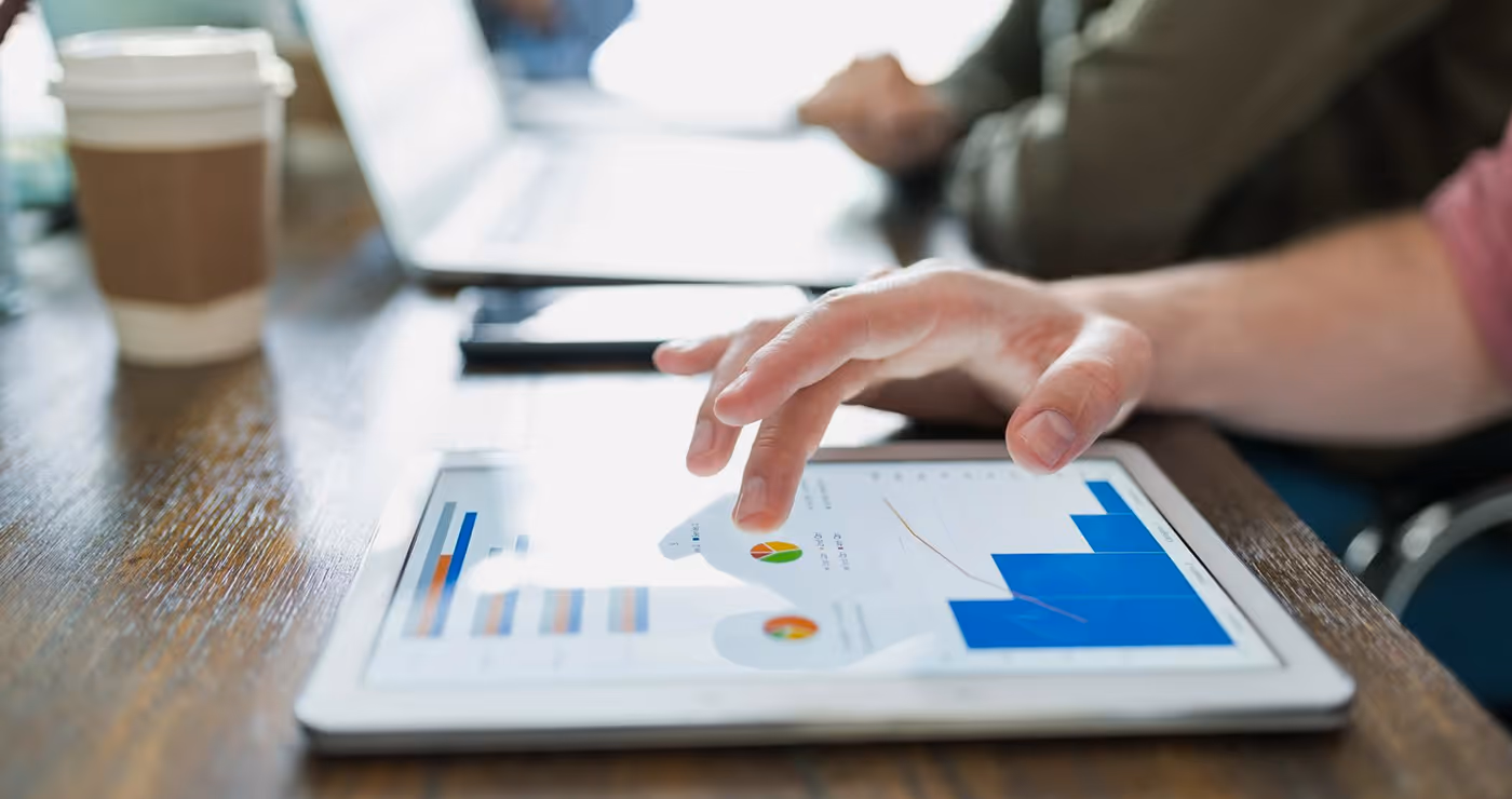 analyzing graphs digital tablet desk