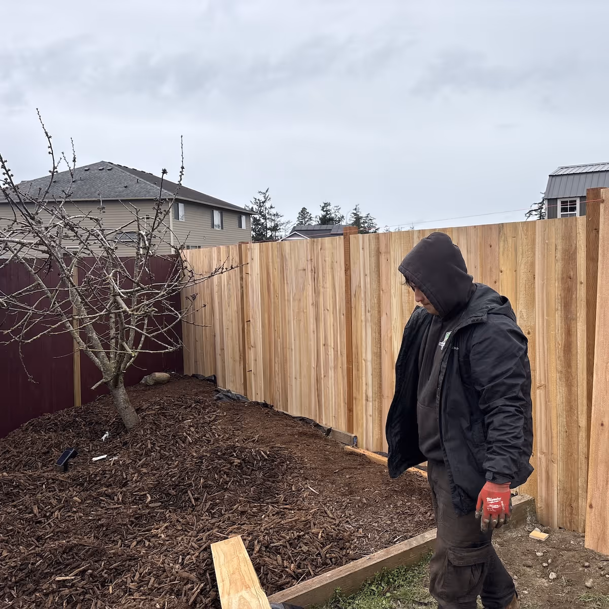 Ebai’s Landscaping crew performing lawn maintenance and landscaping services in Oak Harbor, Washington with attention to detail and professional results
