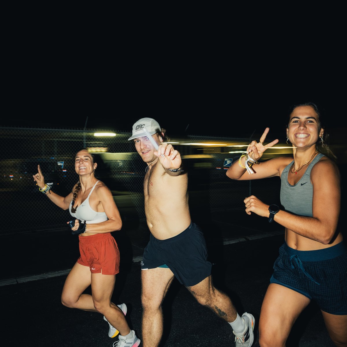 Midnight Moves event — DJ performing for crowd at night run after-party