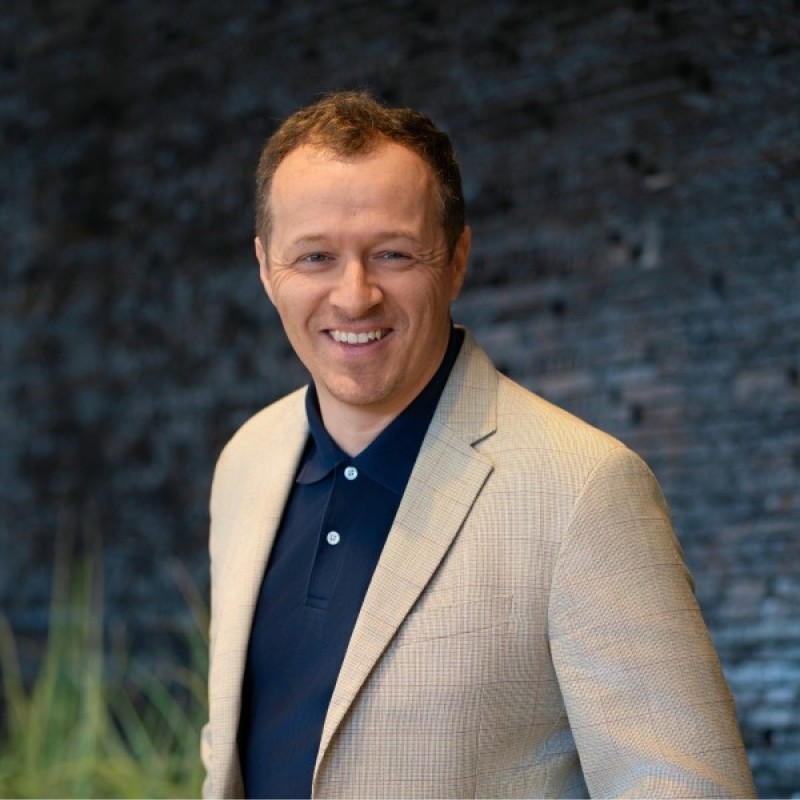 [headshot] image of satisfied customer shaking hands with company representative (for a fintech company)