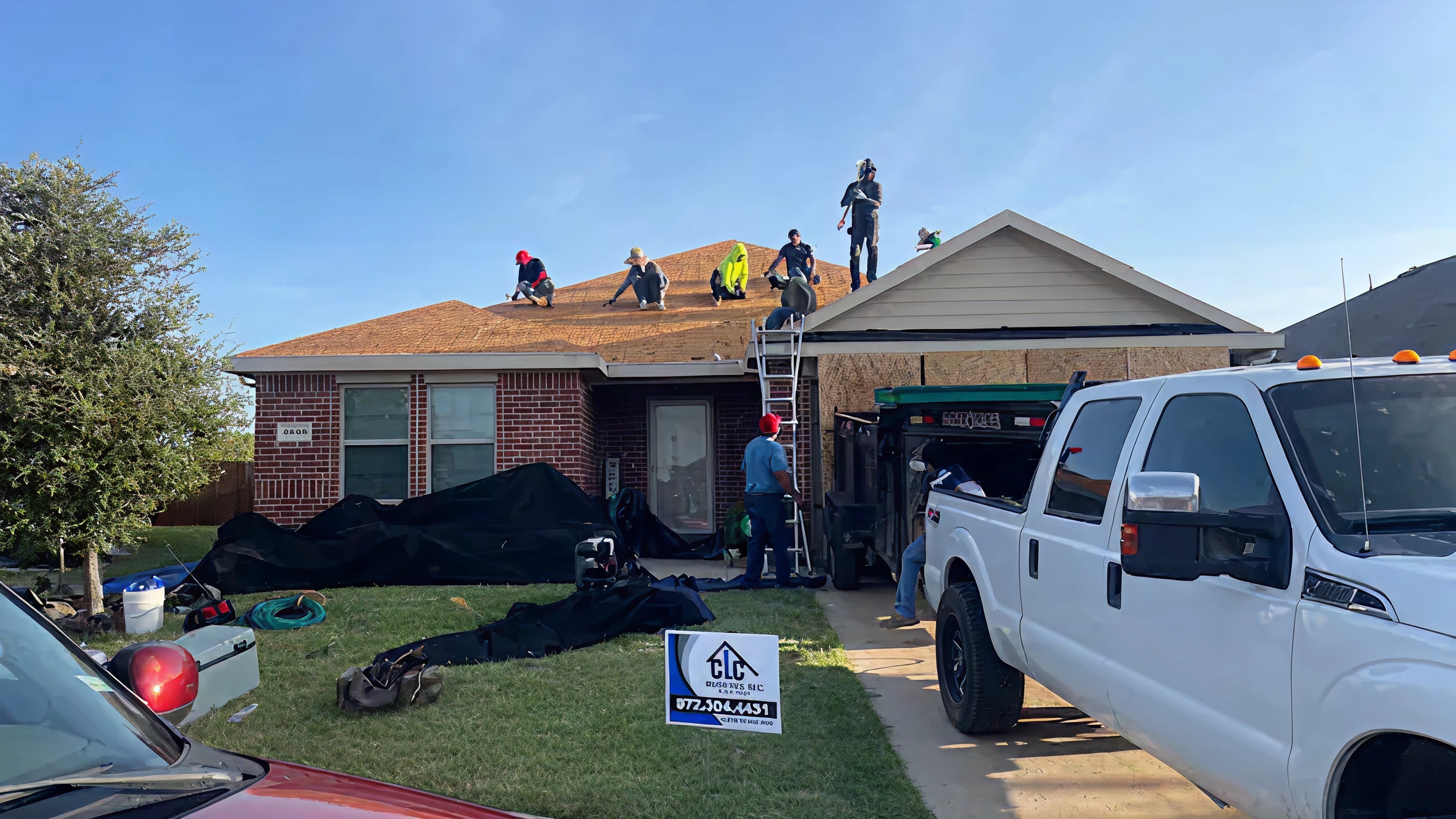 Roofing crew performing a full roof replacement on a residential home in Texas, showcasing CLC Roofing’s expert inspection and repair services.