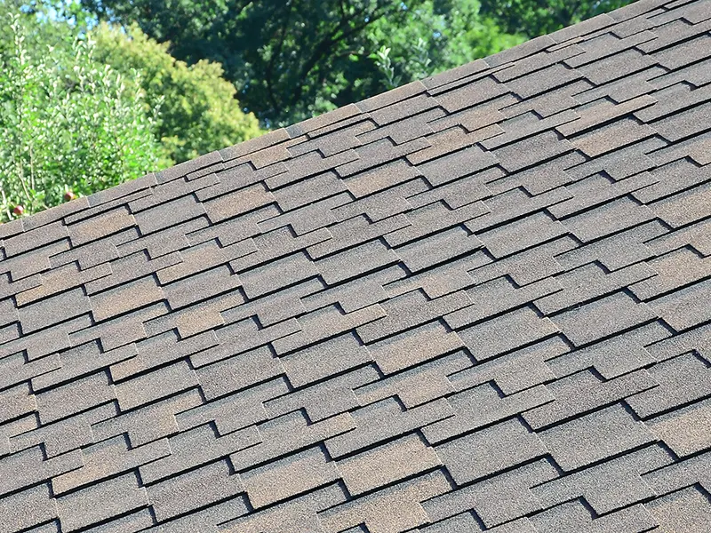 Close-up view of Class 4 impact-resistant asphalt shingles installed on a residential roof in Southlake, Texas, providing enhanced protection against hail and high winds.
