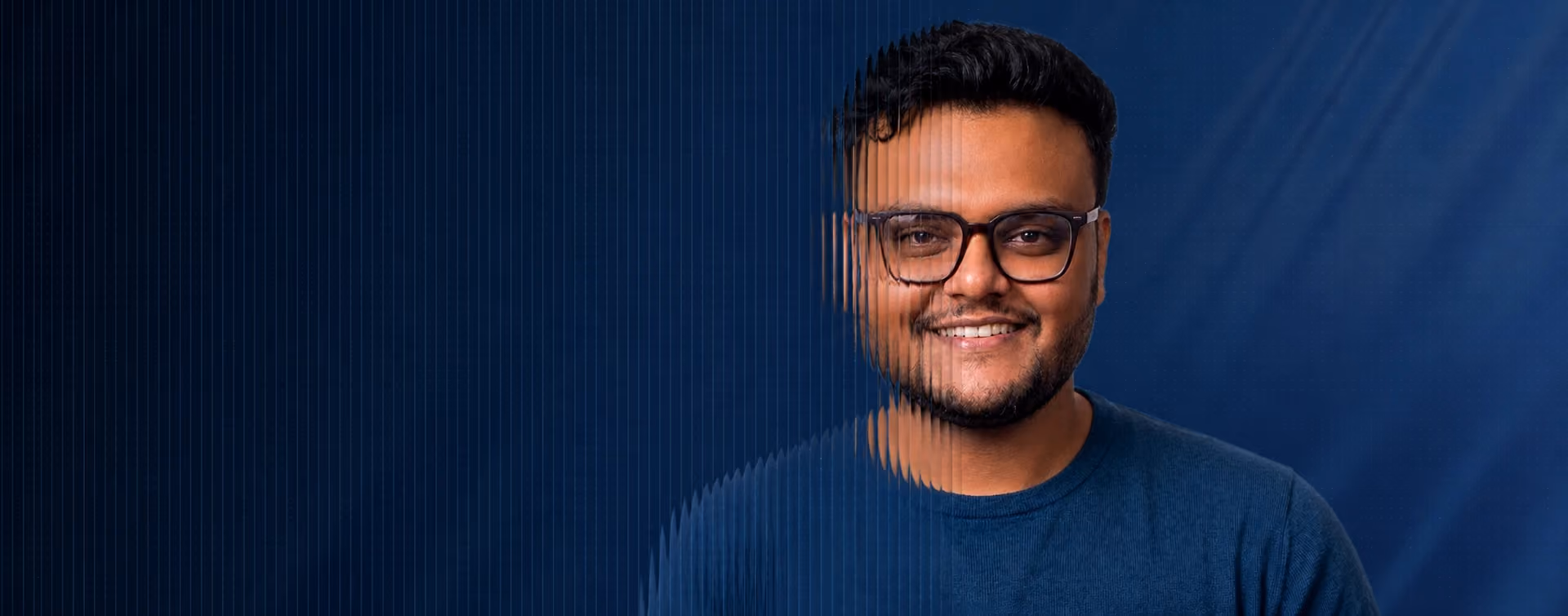 Team member portrait with a dark blue tech-inspired background and fluted glass distortion effect.