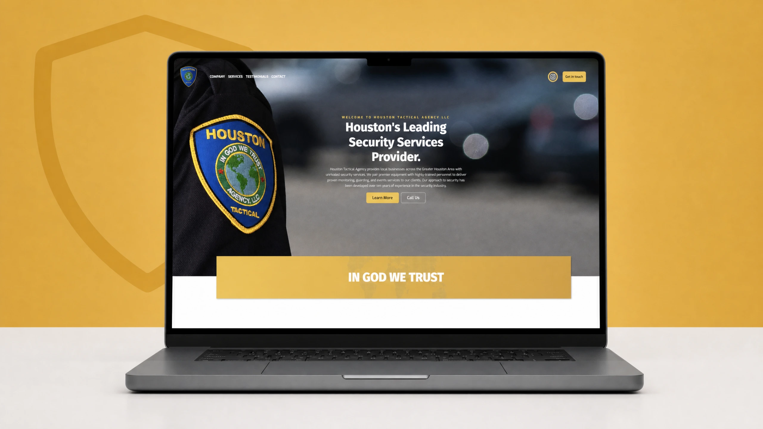 Houston Tactical Agency landing page on a laptop with a golden amber backdrop and shield badge outline