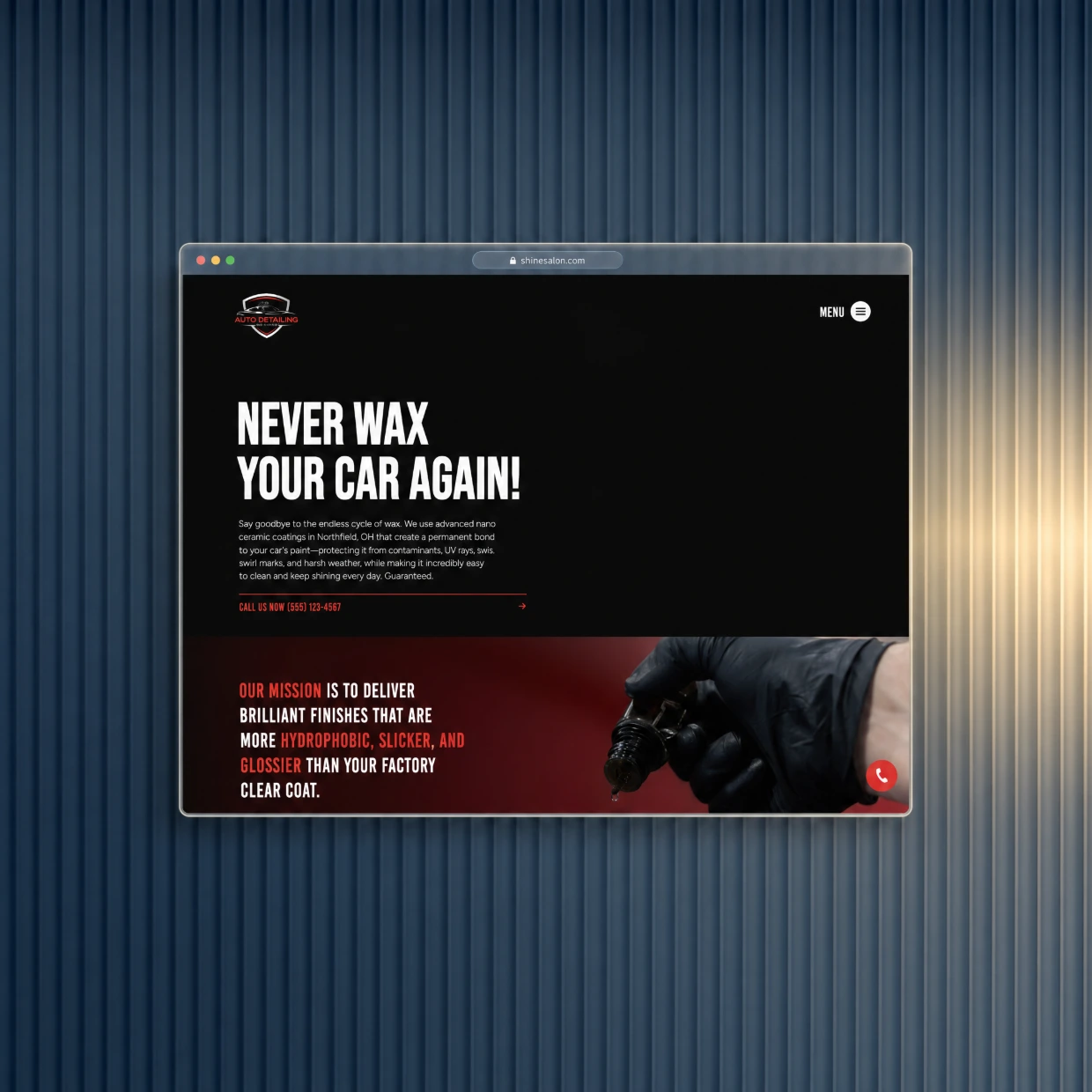 Automotive detailing website in a glass browser window on a navy fluted glass background