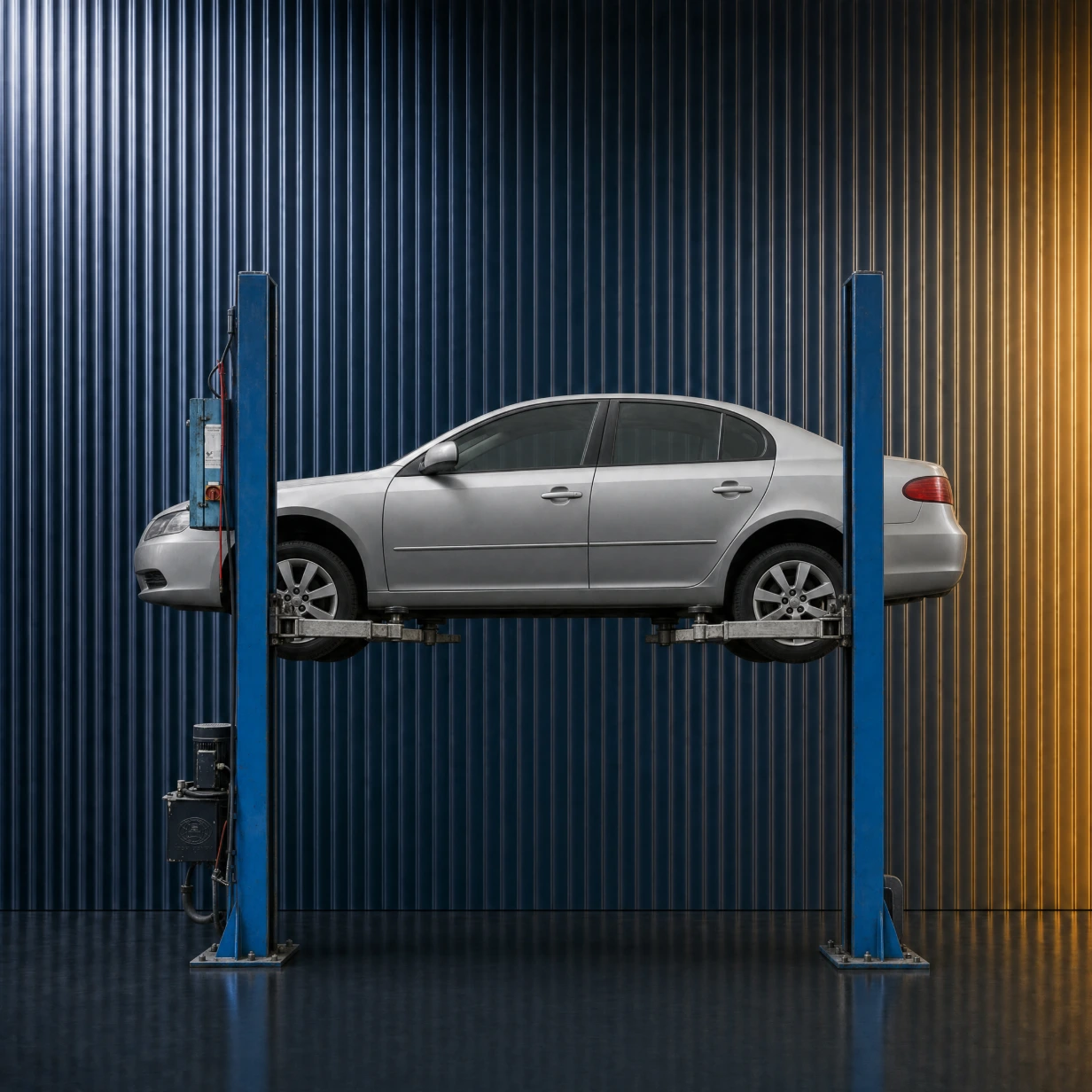 Car raised on a two post lift in front of a navy fluted glass wall, representing automotive marketing