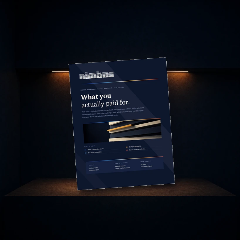 Cover of What You Actually Paid For, Nimbus Media's Google Ads audit worksheet, standing on a concrete step in a dark navy room.