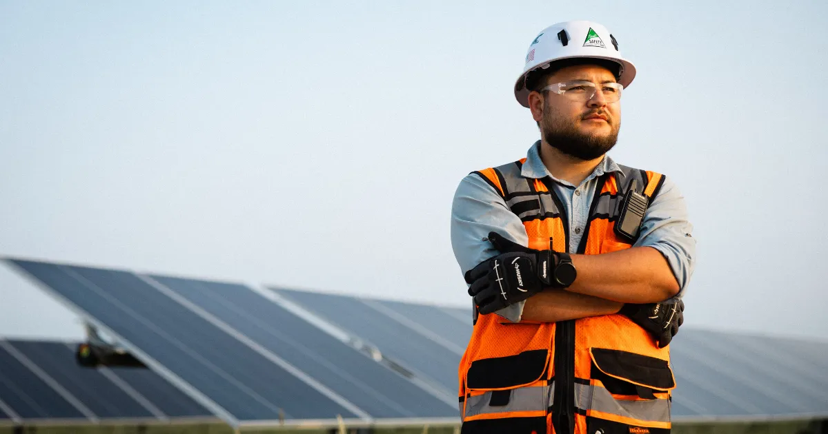 Site workforce manager standing at a solar farm