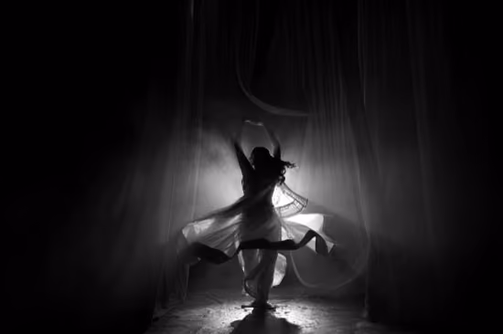 A flamenco dancer in black and white