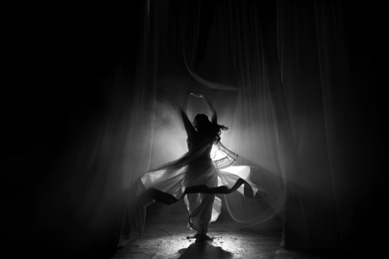 A flamenco dancer in black and white