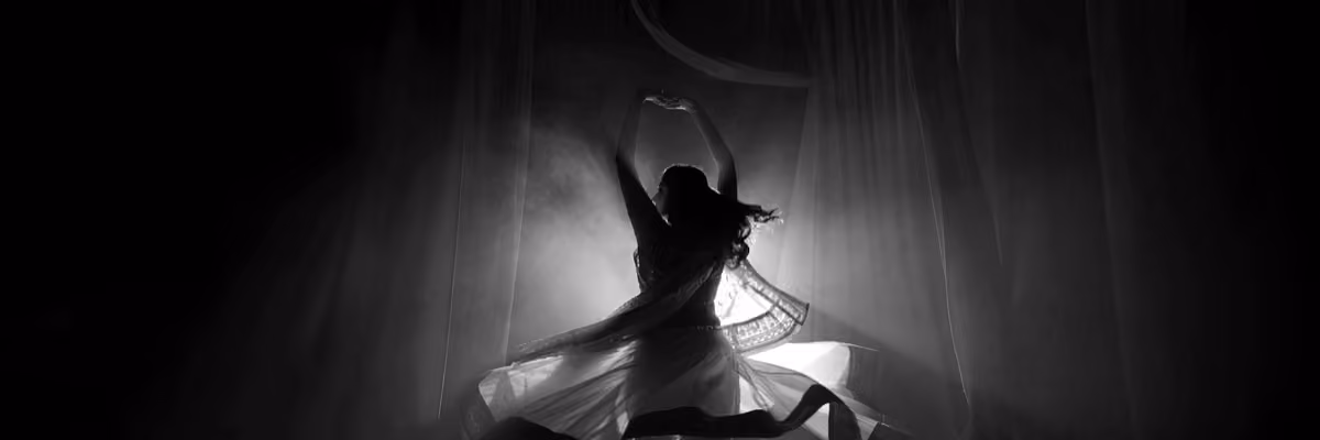 A flamenco dancer in black and white