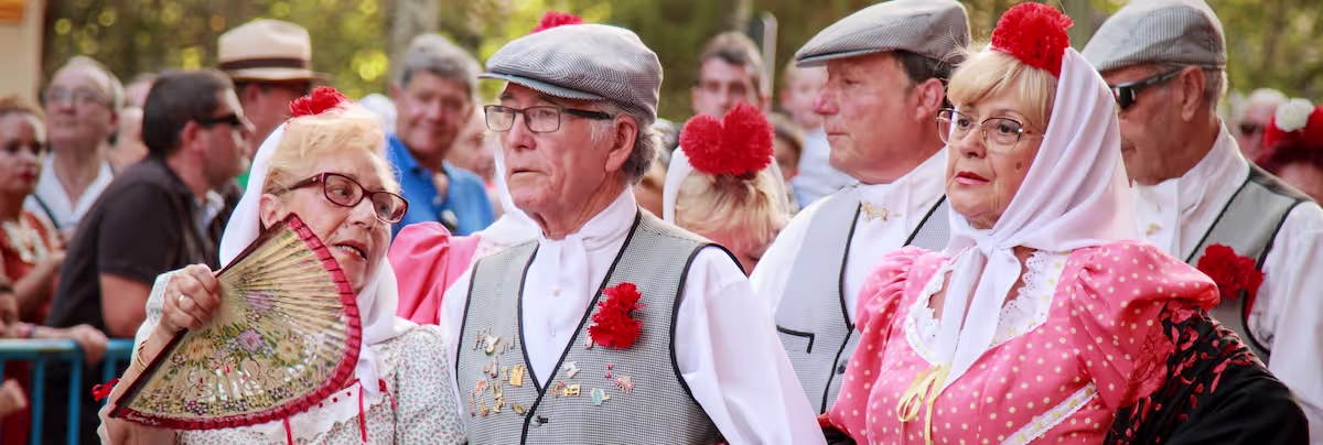 People in traditional dresses at the Virgen de la Paloma festival in Madrid