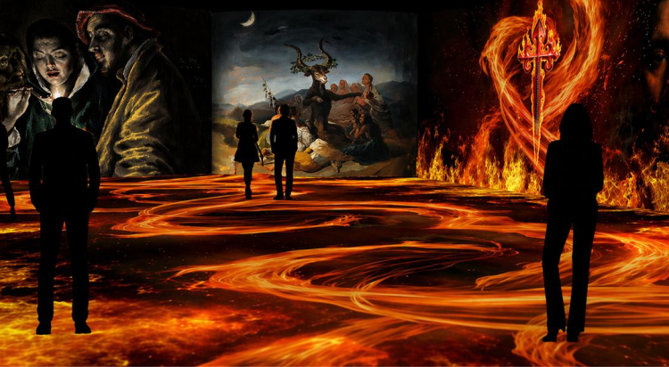 Visitors explore an immersive digital art exhibition inspired by mythology and fire.