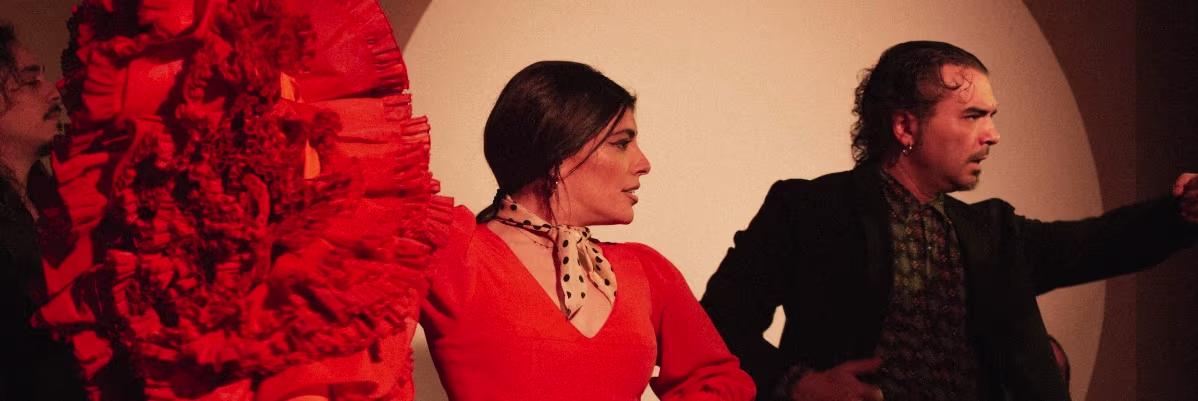 Flamenco dancer Lisi Sfair next to another male dancer at Centro Cultural Flamenco Madrid