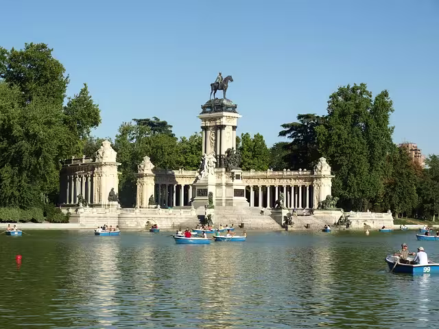 Boats on the lake at El Retiro Park in Madrid, Spain.