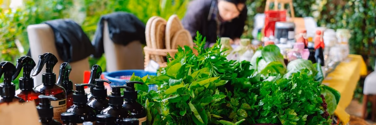 Close up of a exhibitor at BioCultura selling fresh herbs and organic products