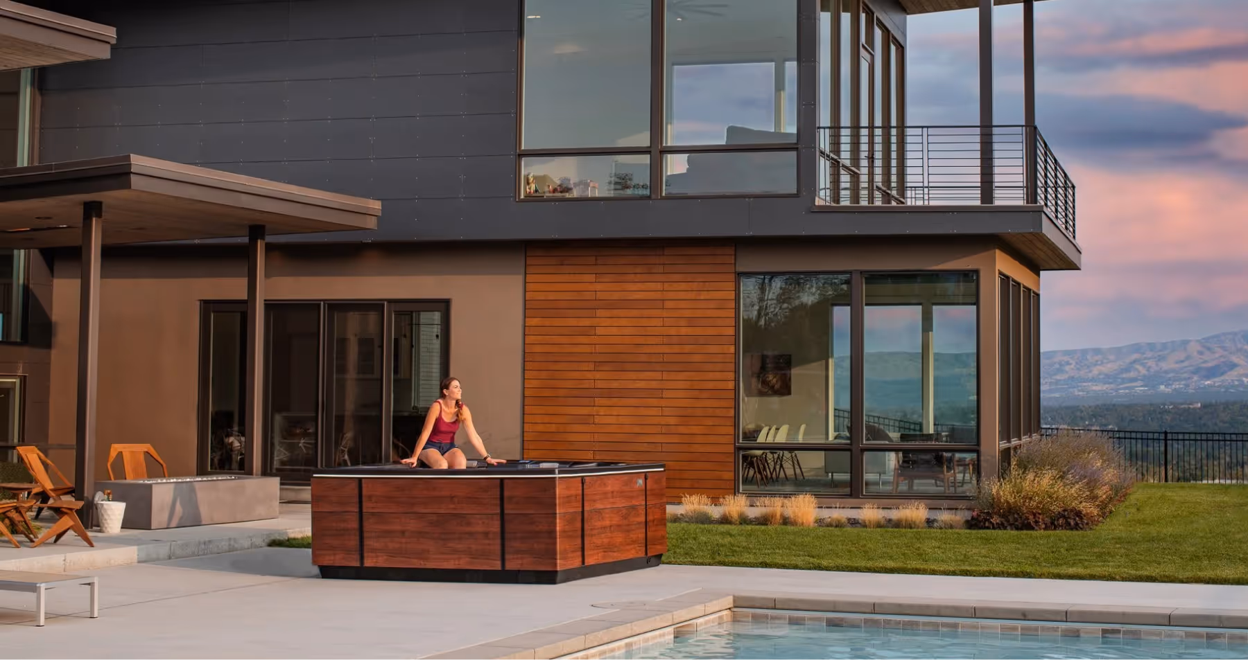 A Bullfrog Spa installed in a residential backyard, ready for use.