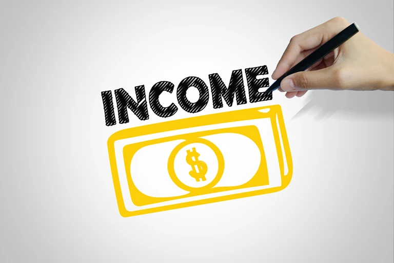 Someone drawing the word "income" above a dollar bill illustration