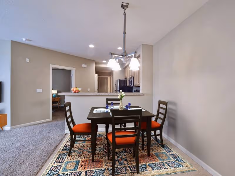 Dining area with table and chairs