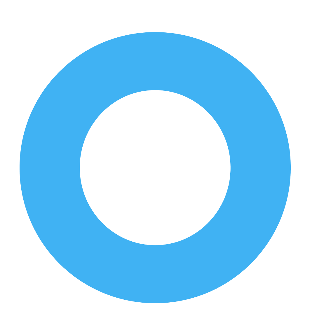 Young child drawing with markers at a classroom table with other children in the background.