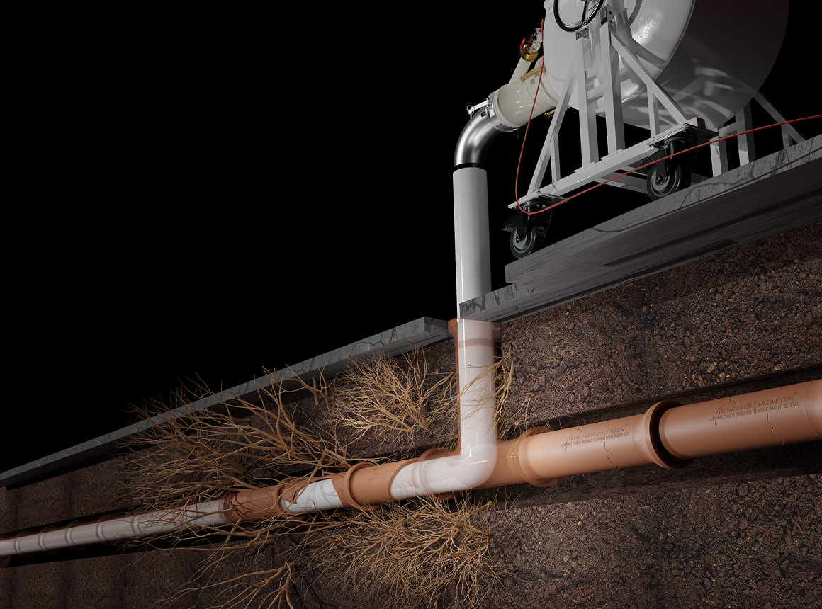 Cross-section of underground tree roots intertwined with a cracked drainage pipe connected to a white above-ground drainage system.