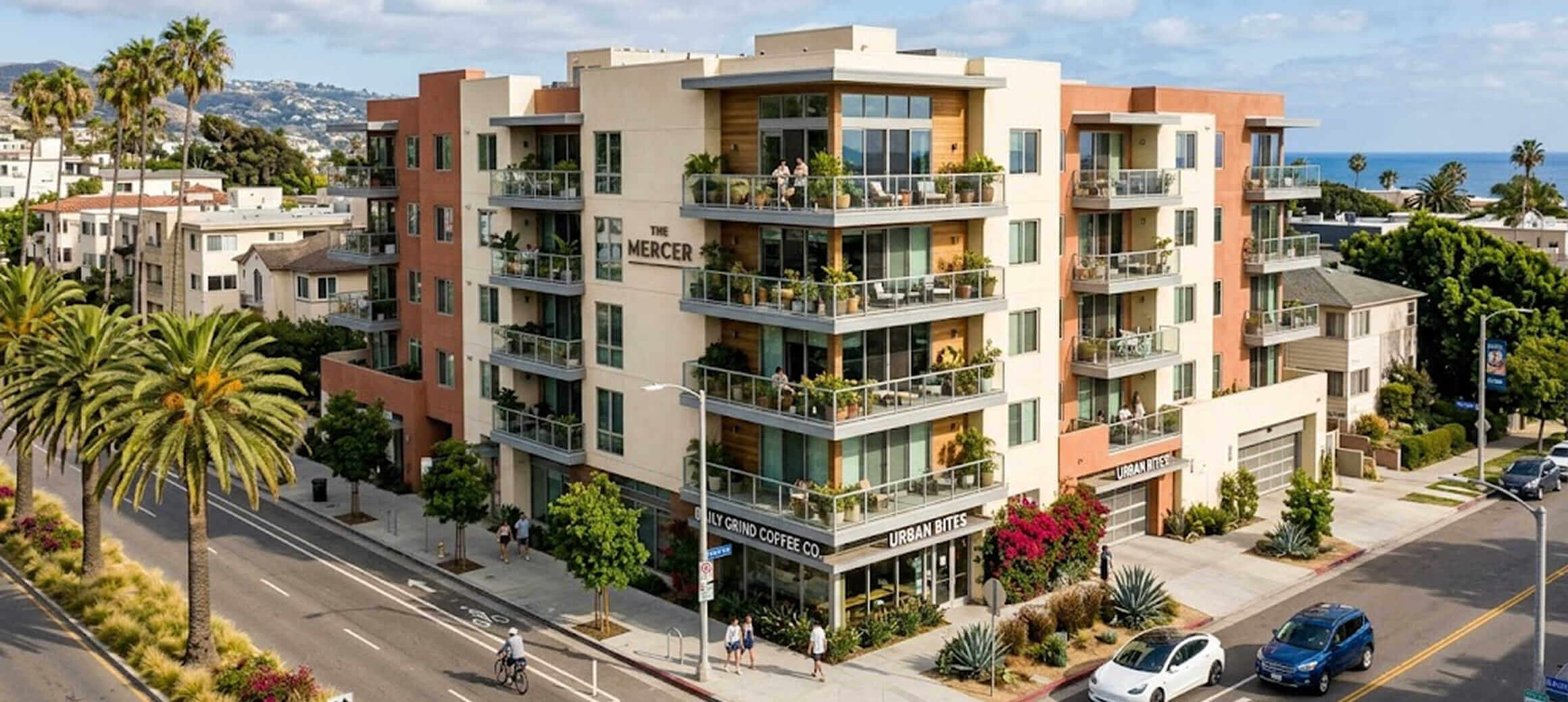 Modern apartment building named The Mercer with balconies, ground-floor coffee shop and restaurant, palm trees, and street view.